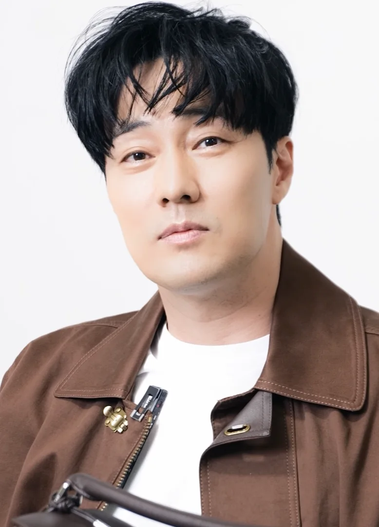 So Ji-sub posing for Marie Claire Korea in May 2025